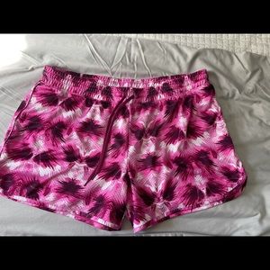 2 pairs of black and/or pink shorts